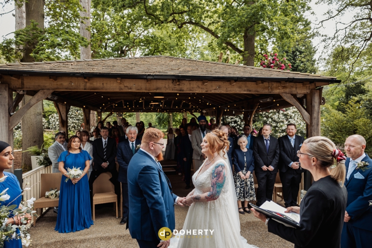 Wedding ceremony in the woods at Hogarths