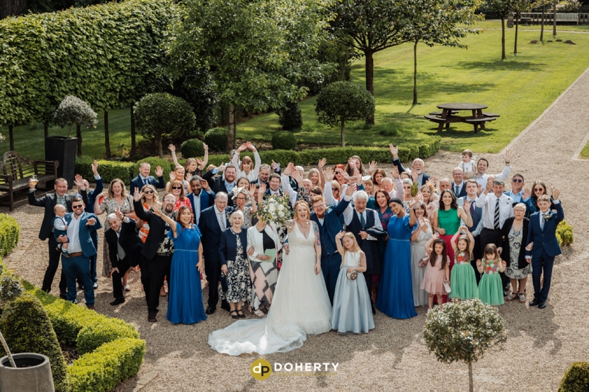 Large group photos of wedding guests