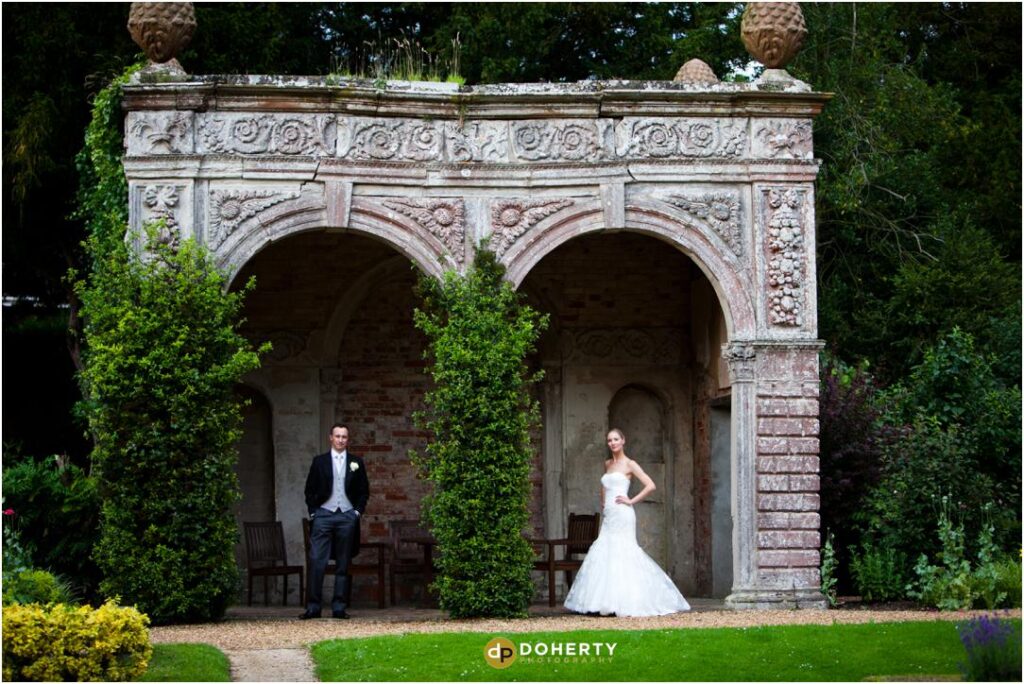 Ettington Park Wedding Couple in gardens