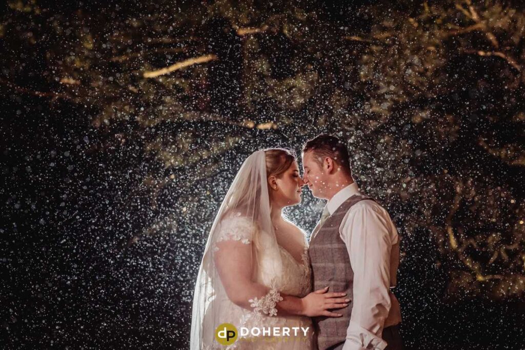 Ashton lodge wedding photo at night in the rain